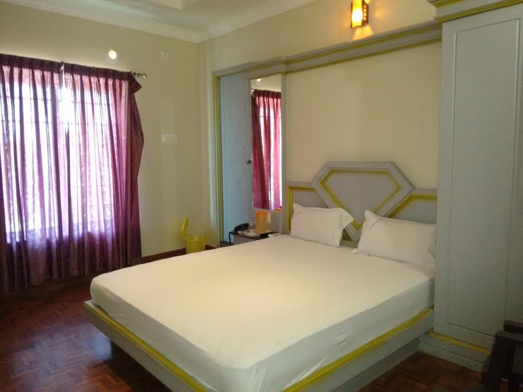 Hotel Chithra Каньякумарі Номер фото